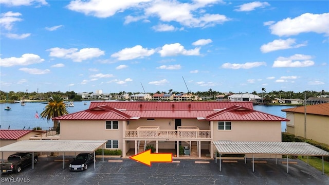 view of building exterior with a water view