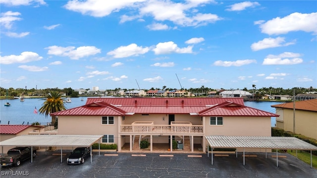 view of building exterior with a water view