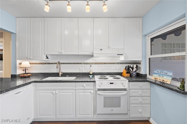 kitchen featuring sink, white appliances, white cabinetry, backsplash, and exhaust hood