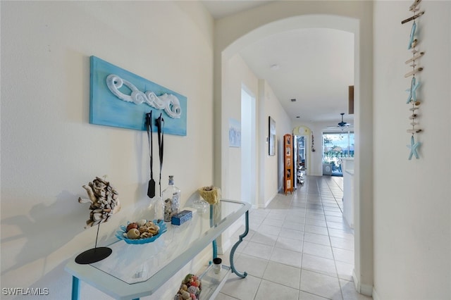 hallway featuring light tile patterned floors