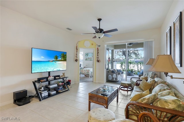 living room featuring ceiling fan and light tile patterned flooring