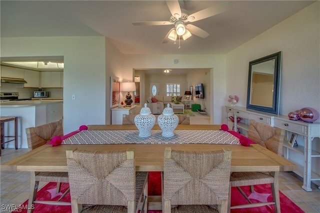 dining room featuring ceiling fan