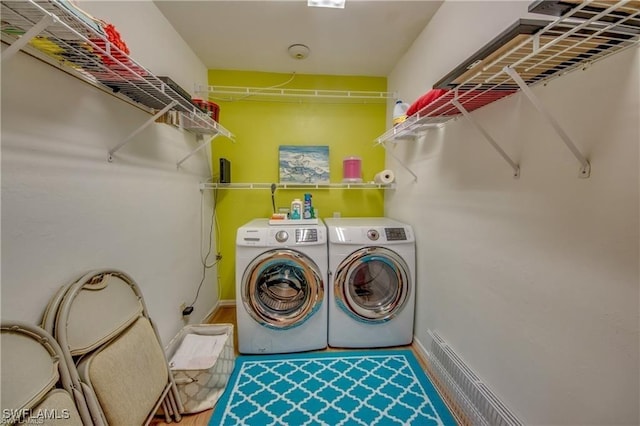 washroom with washing machine and dryer