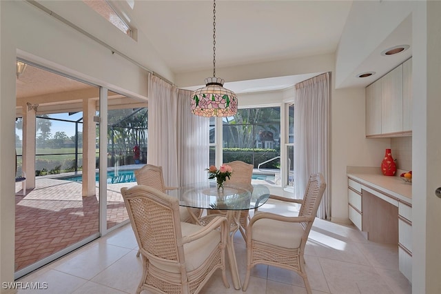 dining area featuring light tile patterned floors