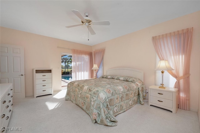 bedroom featuring a ceiling fan, carpet floors, and access to outside