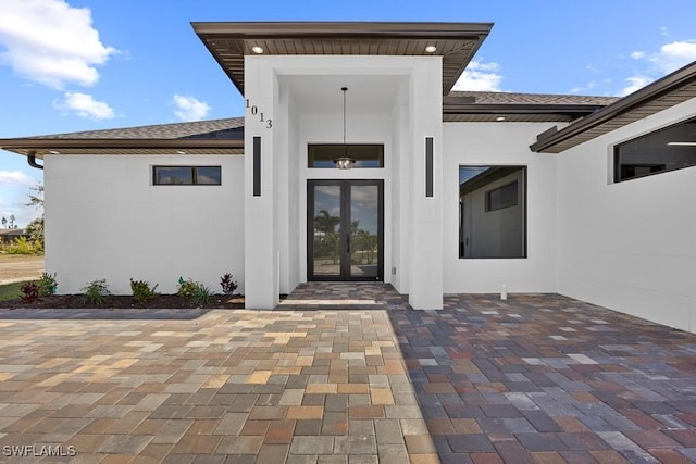 entrance to property with a patio area