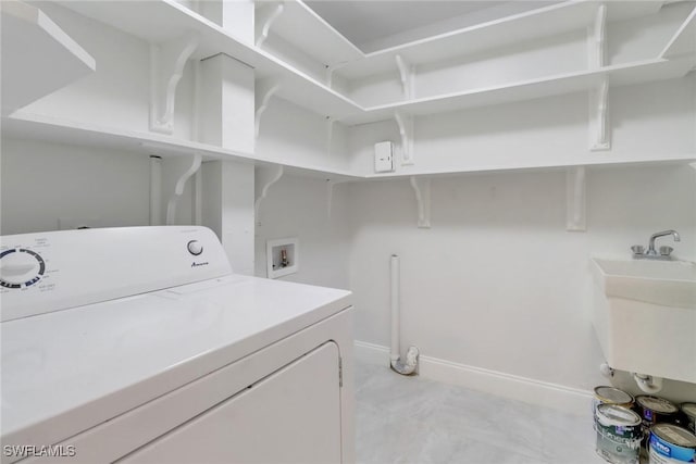 laundry area with washer / clothes dryer and sink