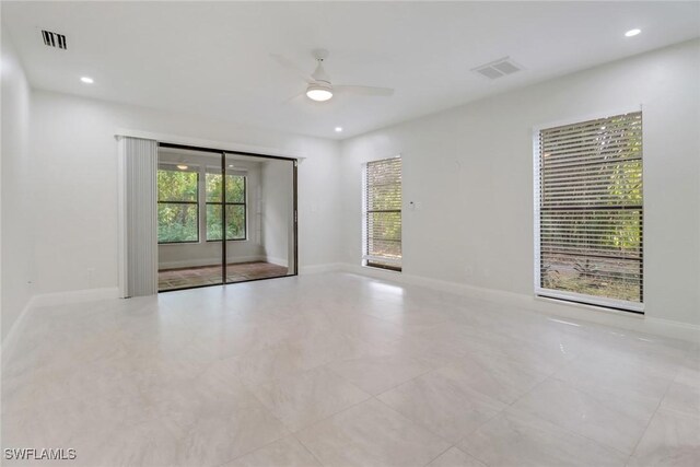 empty room featuring ceiling fan