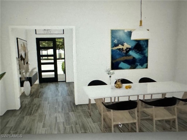 dining area with wood-type flooring