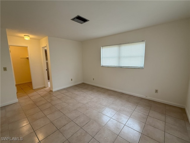 view of tiled empty room