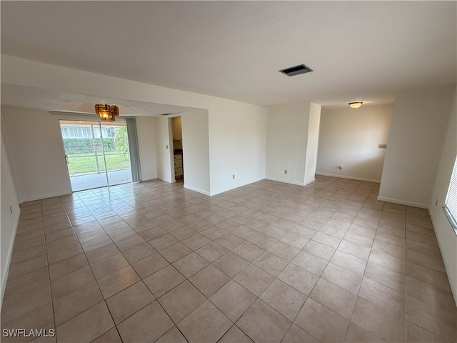 view of tiled spare room