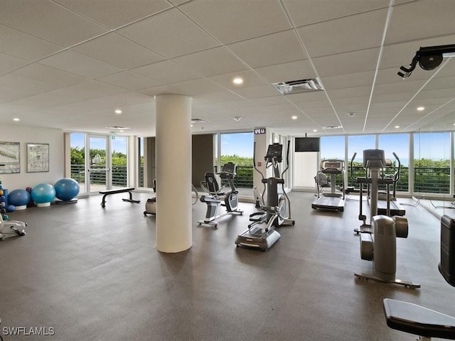 gym with expansive windows and plenty of natural light