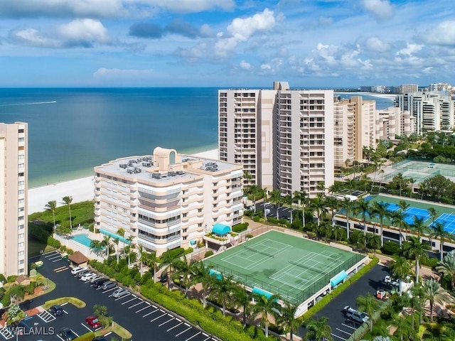 aerial view featuring a water view and a beach view