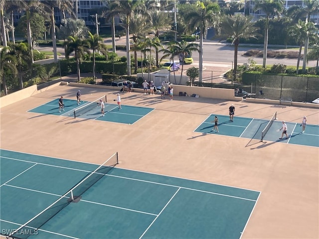 view of sport court with basketball hoop