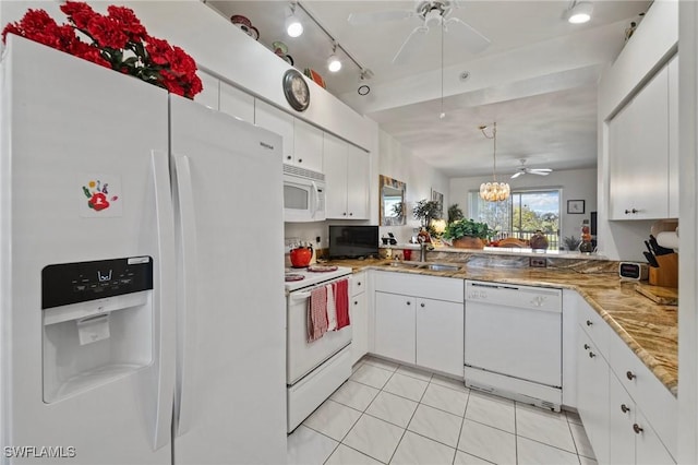 kitchen featuring white cabinetry, white appliances, and sink