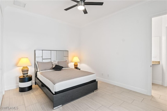 bedroom featuring crown molding and ceiling fan