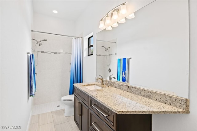 bathroom featuring tile patterned floors, vanity, toilet, and a shower with shower curtain