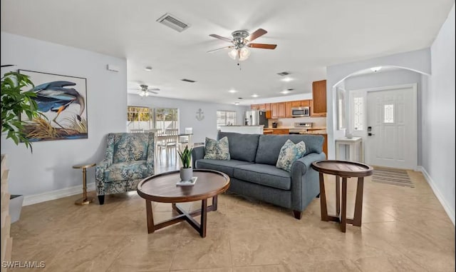 living room with ceiling fan