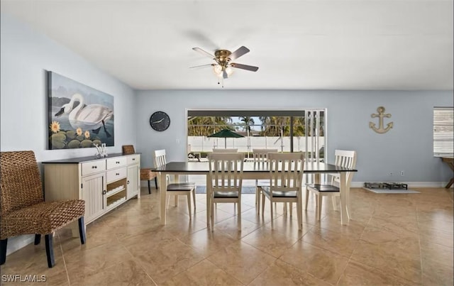 dining area with ceiling fan