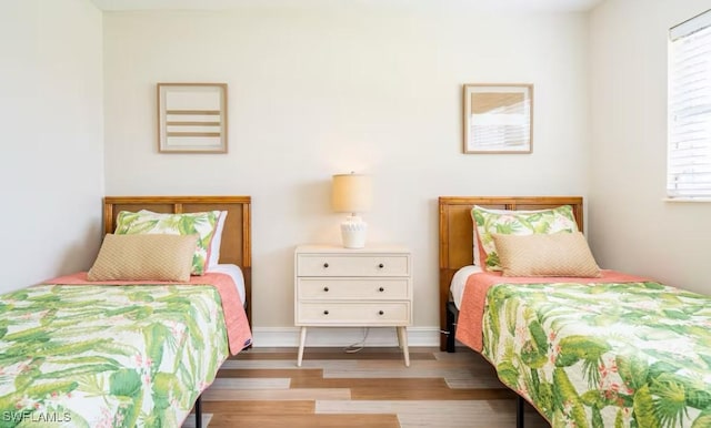 bedroom featuring wood-type flooring