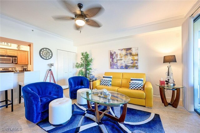 living room featuring ceiling fan and ornamental molding