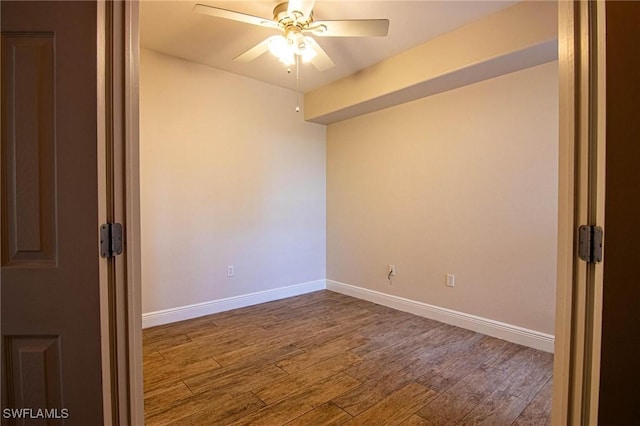 unfurnished room featuring hardwood / wood-style floors and ceiling fan