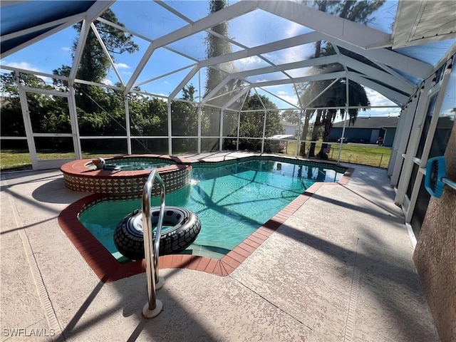 view of pool featuring an in ground hot tub, a patio, and a lanai