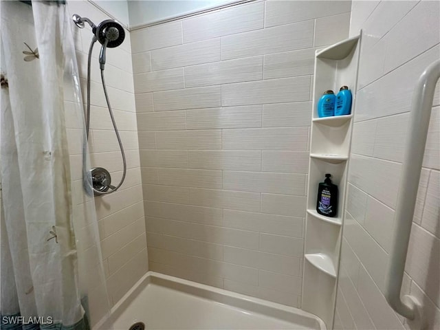 bathroom with walk in shower