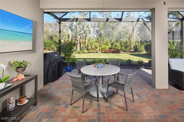 view of patio featuring a grill