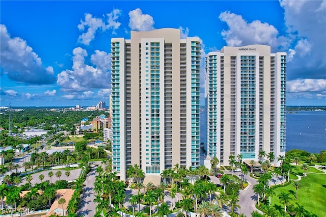 view of building exterior with a water view