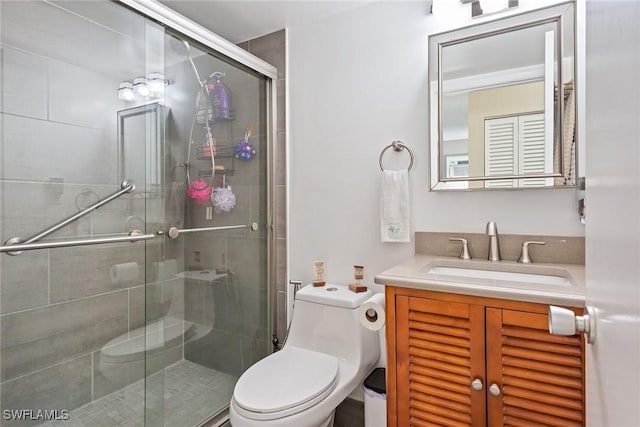 bathroom with walk in shower, vanity, and toilet