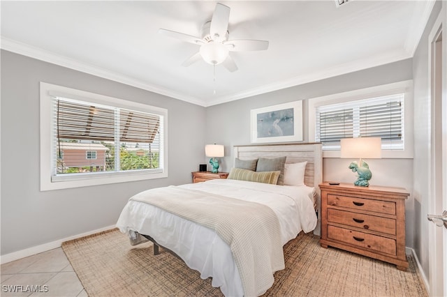 tiled bedroom with crown molding and ceiling fan