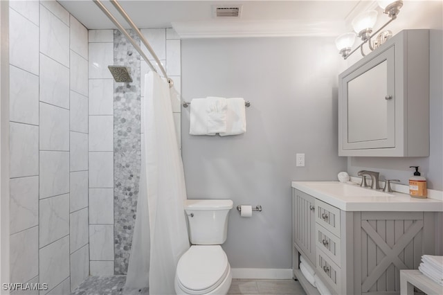 bathroom with walk in shower, vanity, toilet, and crown molding