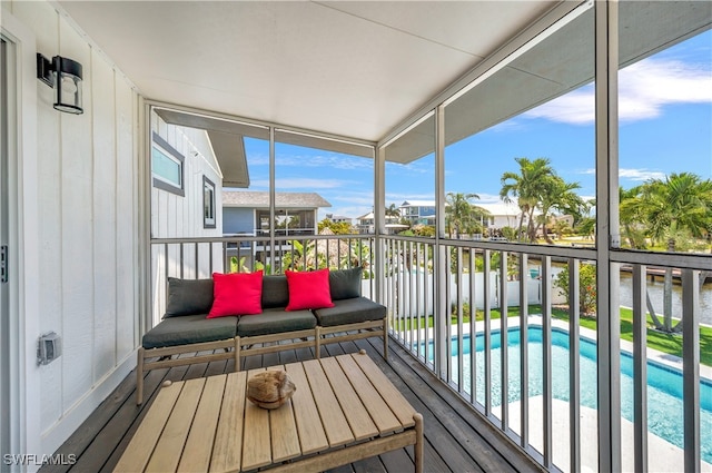 balcony featuring a water view