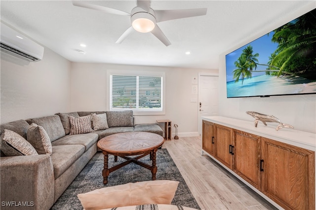 living room featuring an AC wall unit and ceiling fan