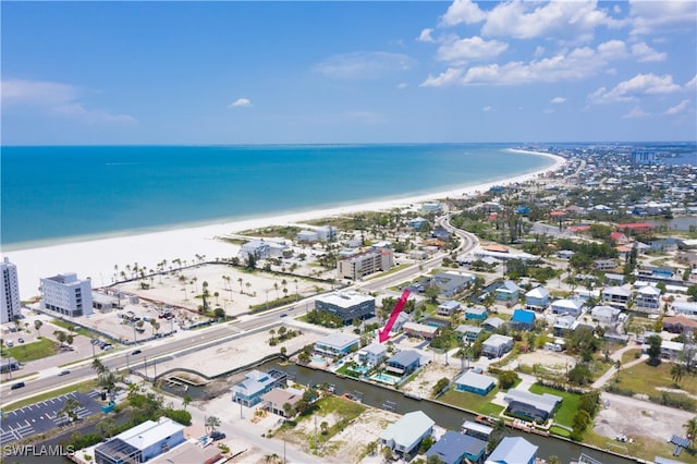 bird's eye view with a beach view and a water view