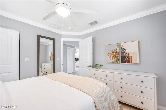 bedroom featuring ornamental molding and ceiling fan