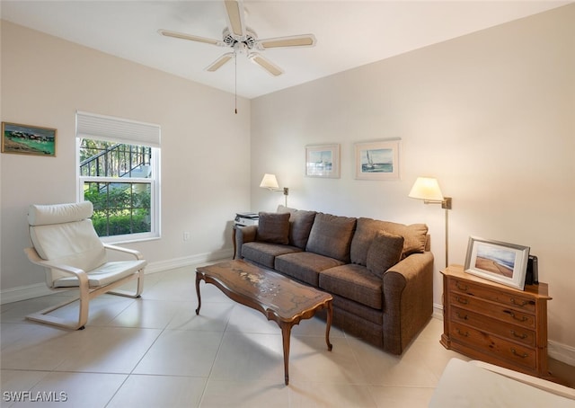 living room featuring ceiling fan and light tile patterned floors