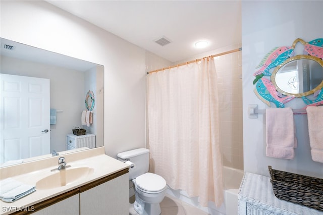 full bathroom featuring vanity, toilet, and shower / tub combo with curtain