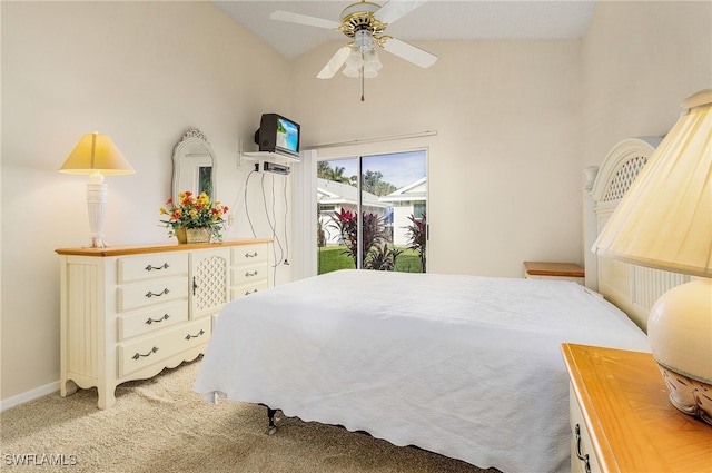 carpeted bedroom featuring vaulted ceiling, access to outside, and ceiling fan