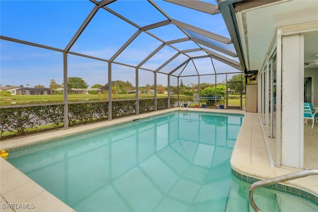 view of pool with a lanai and a patio area