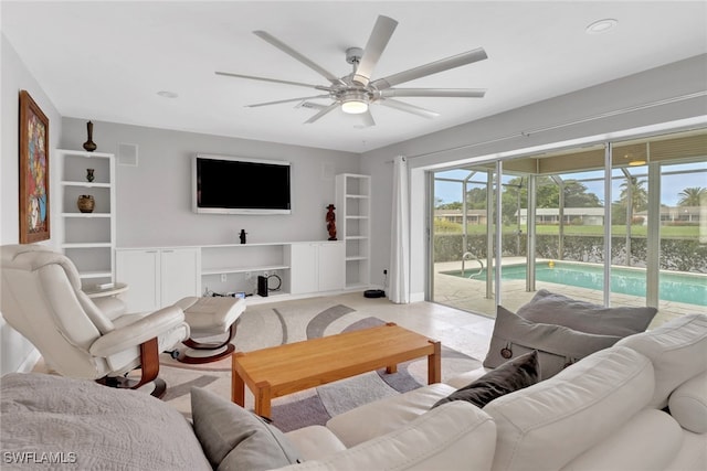 living room with ceiling fan