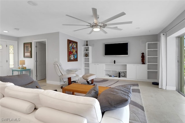 living room with ceiling fan