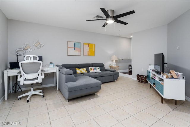 living room featuring light tile patterned flooring and ceiling fan