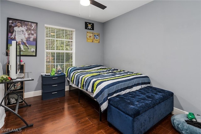 bedroom featuring dark hardwood / wood-style floors and ceiling fan