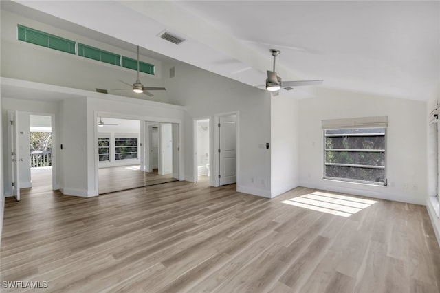 unfurnished living room with light wood-type flooring and ceiling fan