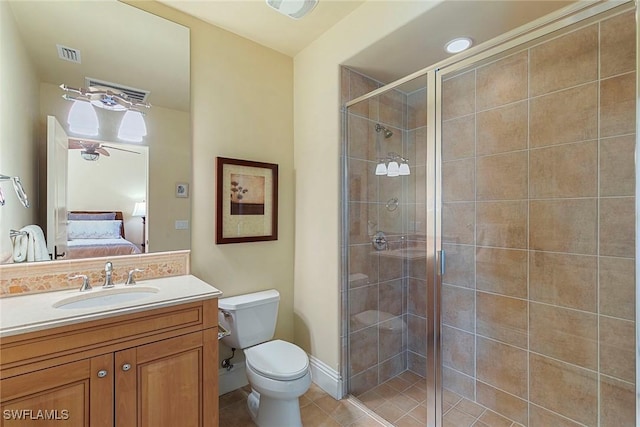 ensuite bathroom featuring visible vents, toilet, ensuite bathroom, a stall shower, and vanity