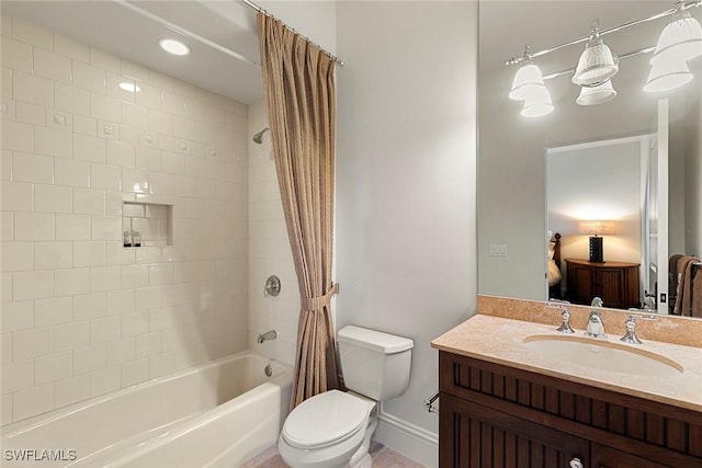 bathroom with toilet, recessed lighting, vanity, baseboards, and shower / bath combo with shower curtain