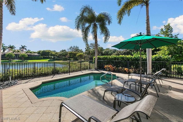 view of swimming pool with a water view, a fenced backyard, a fenced in pool, and a patio