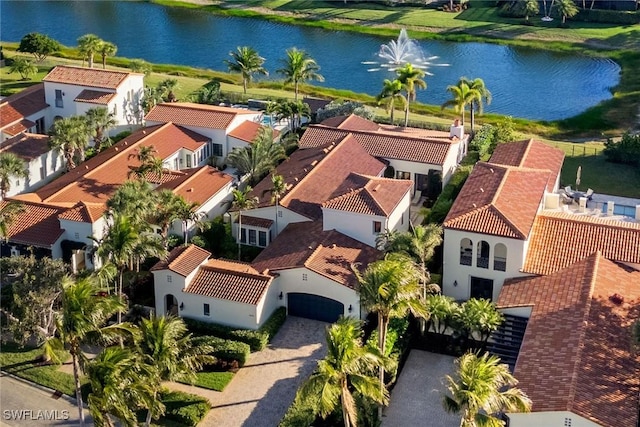 aerial view featuring a water view and a residential view